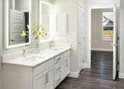 Thumbnail 16 of 50 - Bathroom with vanity and toilet at Icon Apartment Homes at Ferguson Farm, Bozeman