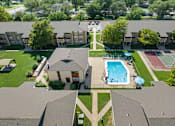 Thumbnail 1 of 18 - a view of the pool from the roof of a house
