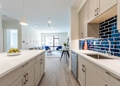 Thumbnail 8 of 82 - Two-Bedroom Apartments in Beverly, MA
- Holmes Beverly- Stainless-Steel Appliances with Modern Style Cabinets and Kitchen Island