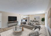Thumbnail 3 of 35 - A living room with a grey couch, a coffee table, and a television.