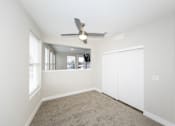 Thumbnail 9 of 31 - A room with a ceiling fan and carpeted floor.at Tiffany Flats, Ohio, 43231