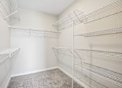 Thumbnail 15 of 71 - Empty white shelving unit in a room.