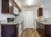 Thumbnail 1 of 19 - Kitchen at Bayside Apartment Homes, Hilliard, OH