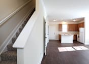 Thumbnail 16 of 19 - Staircase leading to the kitchen at Bayside Apartment Homes, Hilliard, OH, 43026