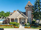 Thumbnail 2 of 22 - A house with a small garden in front.