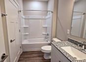 Thumbnail 6 of 16 - A bathroom of an available apartment at Greenwood Commons Apartments in Delaware, OH.