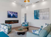 Thumbnail 41 of 49 - Living Area With Fireplace And TV at Imperial Crossing Luxury Apartment Homes, Bonita Springs