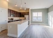Thumbnail 14 of 37 - Living and kitchen at The Flats at Summit Station, South Park, Pennsylvania