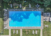 Thumbnail 3 of 26 - An aerial view of a swimming pool surrounded by lounge chairs.