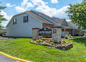 Thumbnail 3 of 30 - Front entrance sign for River Valley Apartments in Lancaster, OH.