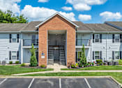 Thumbnail 13 of 30 - Entry-way and patio view of apartments at River Valley in Lancaster, OH.