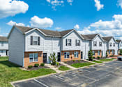 Thumbnail 18 of 30 - Entry-way and patio view of apartments at River Valley in Lancaster, OH.