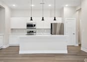 Thumbnail 65 of 71 - Kitchen with appliances of an apartment home.