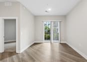 Thumbnail 62 of 71 - Large living area with patio/balcony.
