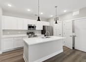 Thumbnail 70 of 71 - Large kitchen with island of an apartment home at Tiffany Flats.