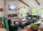 Thumbnail 17 of 32 - Resident Lounge w/Fireplace at The Point at Gateways, New Jersey  