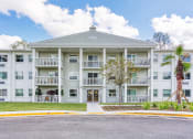 Thumbnail 3 of 13 - Apartment building exterior at Campus Towers