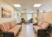 Thumbnail 3 of 12 - Lobby with comfortable couches and chairs and Holy Cross Manor I