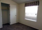Thumbnail 13 of 13 - an empty room with a large window and a closet
