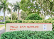 Thumbnail 1 of 22 - Signage in front of Villa San Carlos Senior Apartments