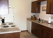 Thumbnail 9 of 18 - Modern Kitchen With Custom Cabinet at Parkside Manor, Coralville, IA, 52241