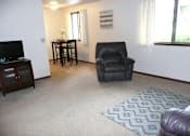Thumbnail 16 of 18 - Living Room With Dining Area at Parkside Manor, Iowa, 52241