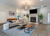 Thumbnail 2 of 18 - Clubhouse With Expansive Windows and fireplace at The Apartments at The Sycamores, Reston, VA, 20190