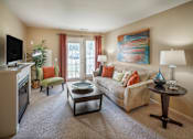 Thumbnail 4 of 25 - Warm Living And Dining Room at The Apartments at Wellington Trace, Maryland