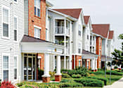 Thumbnail 2 of 25 - Elegant Exterior View Of Property at The Apartments at Wellington Trace, Frederick