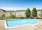 Thumbnail 1 of 25 - Swimming Pool And Sundeck at The Apartments at Wellington Trace, Frederick, MD, 21703