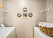 Thumbnail 18 of 25 - Modern Laundry Room at The Apartments at Wellington Trace, Frederick, Maryland
