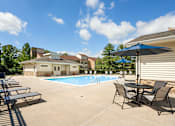 Thumbnail 21 of 28 - Swimming Pool And Relaxing Area at The Apartments at Elmwood Terrace, Frederick