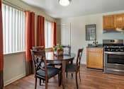 Thumbnail 10 of 28 - Fully Equipped Kitchens And Dining at The Apartments at Elmwood Terrace, Frederick, Maryland