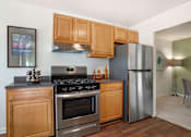 Thumbnail 9 of 28 - Amazing kitchens with modern appliances at The Apartments at Elmwood Terrace, Frederick
