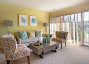 Thumbnail 6 of 28 - Well Lit Living Room at The Apartments at Elmwood Terrace, Maryland, 21702