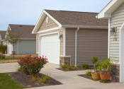 Thumbnail 1 of 9 - Lake Orion MI Apartment Rentals Redwood Waterstone At Village Square Exterior Front