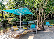 Thumbnail 3 of 20 - Pool lounge area