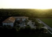 Thumbnail 12 of 12 - aerial view of St. John XXIII Villas surrounded by lush trees