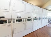 Thumbnail 15 of 17 - onsite laundry facility in Gateway Townhomes