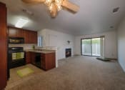 Thumbnail 26 of 37 - Kitchen and Living Room