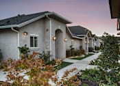 Thumbnail 12 of 17 - Breezeway and Apartment Homes