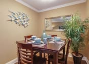 Thumbnail 7 of 19 - Dining room with table and chairs