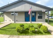 Thumbnail 1 of 8 - Exterior of leasing office at Kings Place Apartment Homes, Thibodaux, LA
