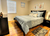 Thumbnail 7 of 11 - Furnished bedroom at Waters Mark Apartment Homes, Gulfport