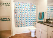 Thumbnail 12 of 19 - Bathroom with tub and shower