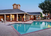Thumbnail 1 of 19 - Pool and exterior of clubhouse
