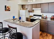 Thumbnail 2 of 9 - Kitchen with breakfast bar and stools