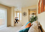 Thumbnail 2 of 11 - Furnished living and dining area