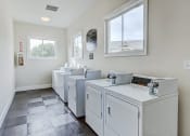 Thumbnail 16 of 30 - Laundry Center at apartment complex