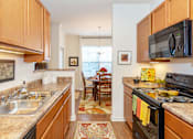 Thumbnail 14 of 29 - Fully Furnished Kitchen at Garden Springs, Chester, 23831